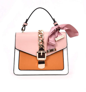 luxury handbag with scarf, chain and buckle