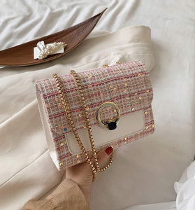 Woven shoulder cross bag with gold chain