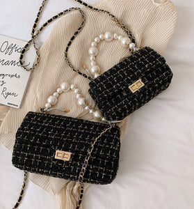 luxury woven handbag