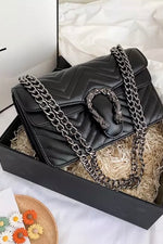 Quilted designer label handbag