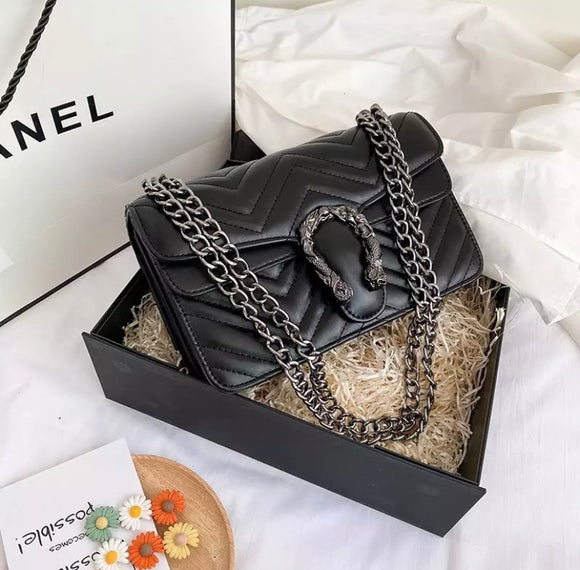 Quilted designer label handbag