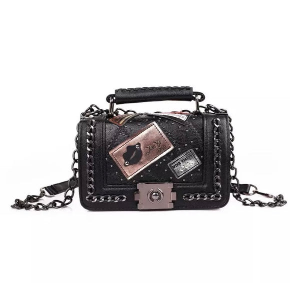 Pure leather designer purse, with badges