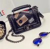Pure leather designer purse, with badges