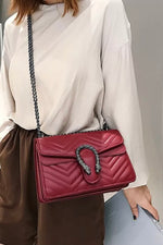 Quilted designer label handbag