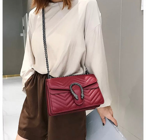 Quilted designer label handbag